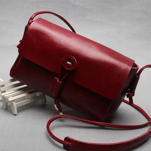 Leather bag bag buttons Korea 2015 new fashion shoulder bag ladies bags wholesale cross retro trend Heaventlyshop